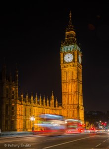 Image of Big Ben at night with london buses